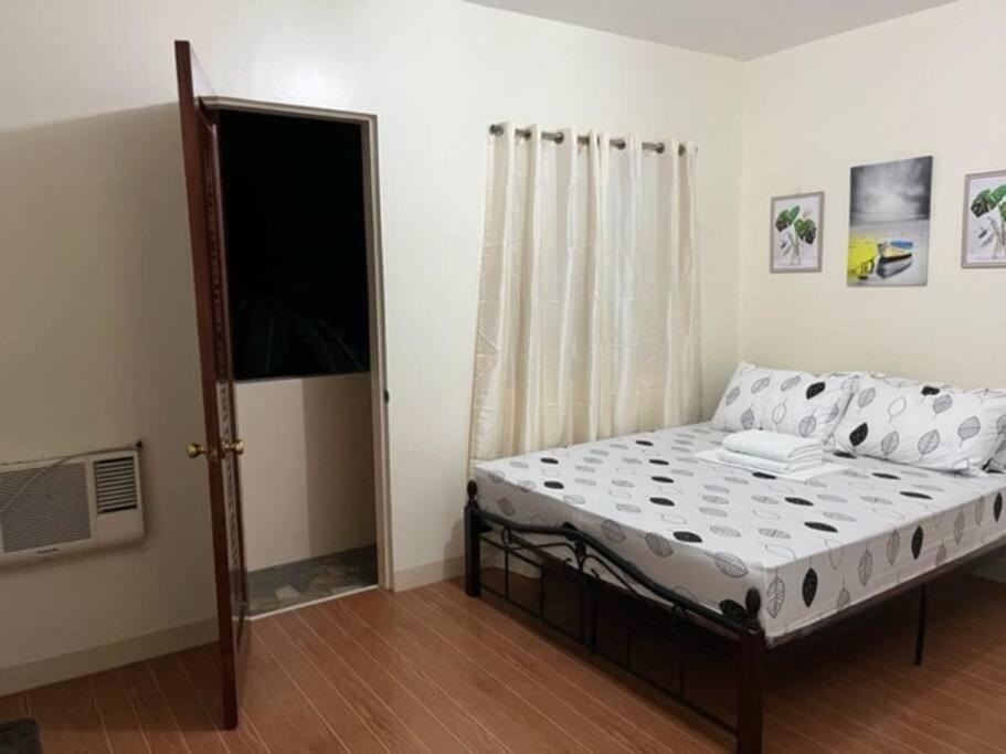 Estilo Apartment 2-Storey Clarin  Экстерьер фото