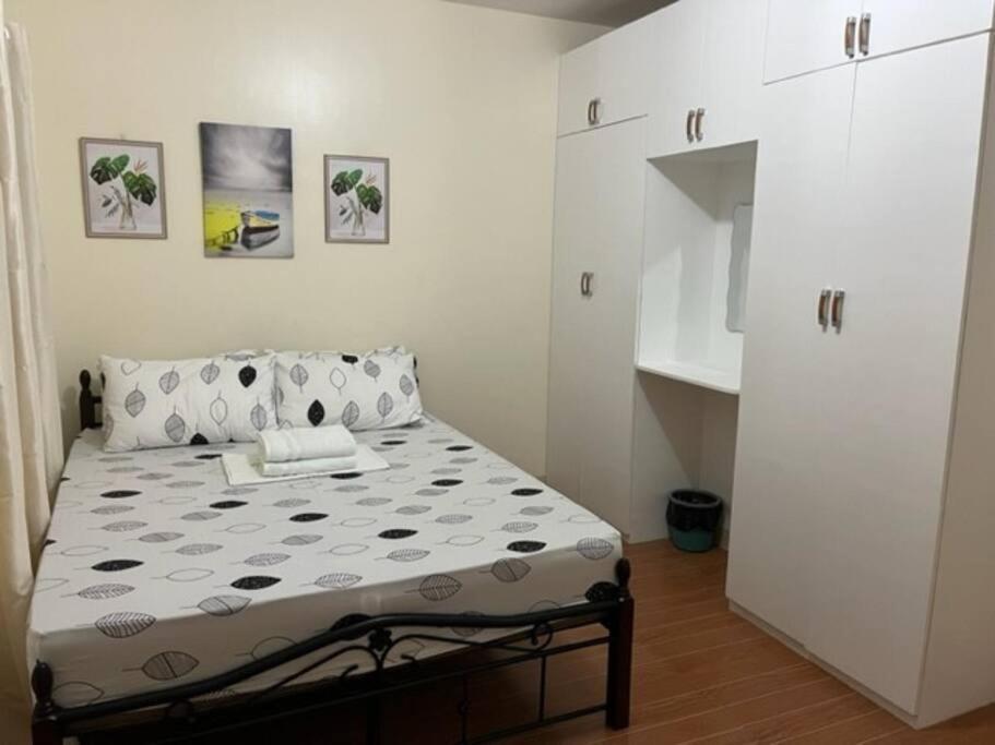 Estilo Apartment 2-Storey Clarin  Экстерьер фото