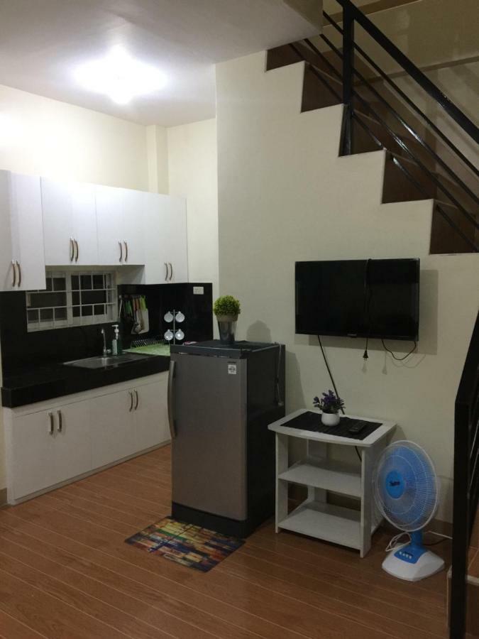 Estilo Apartment 2-Storey Clarin  Экстерьер фото