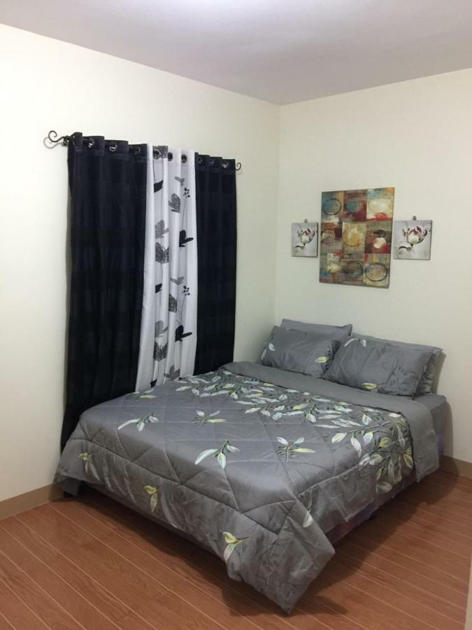 Estilo Apartment 2-Storey Clarin  Экстерьер фото